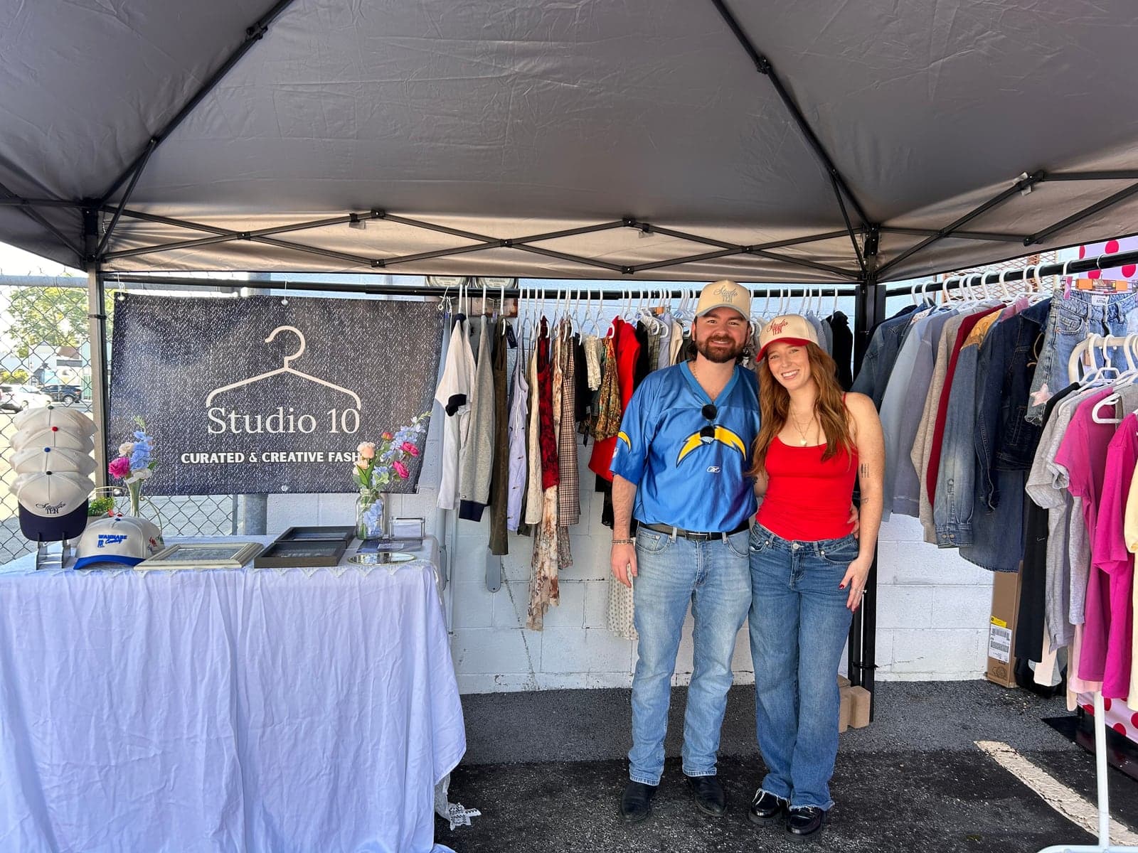 The Studio 10 booth at an outdoor market